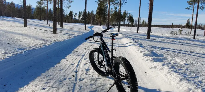 Fatbiking on a snowy trail in Levi
