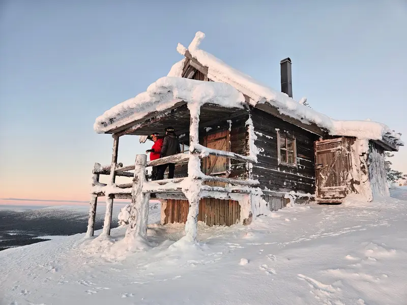Santa's Cabin in its winter coat on top of Levi fell